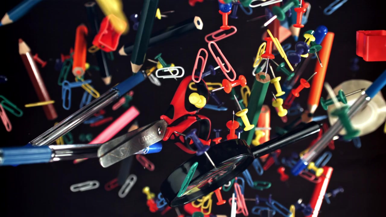 Colorful Office and School Supplies Floating in Slow Motion