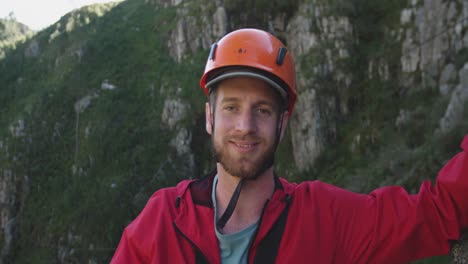 young caucasian man smiling in helmet