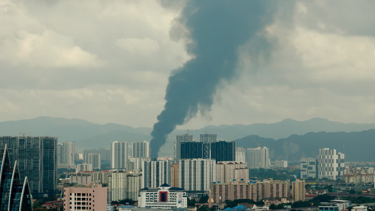 Large Smoke Plume Over City