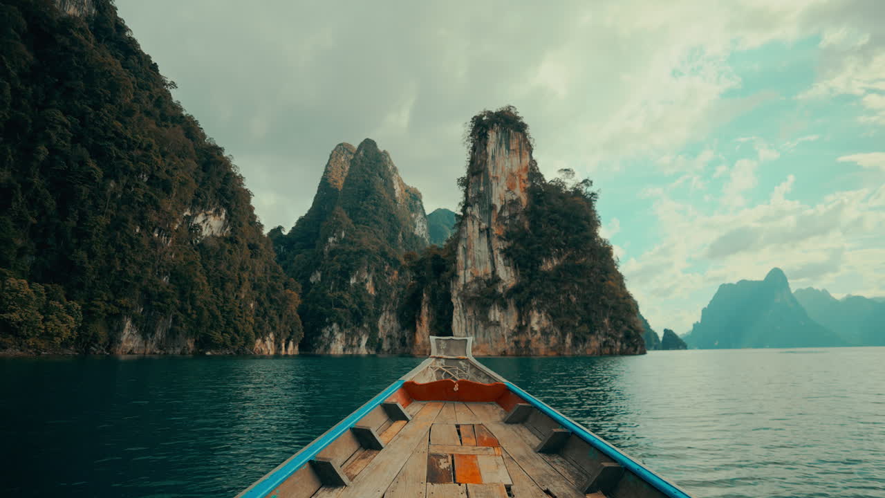 Scenic Boat Ride Through Limestone Karsts on a Thai Lake