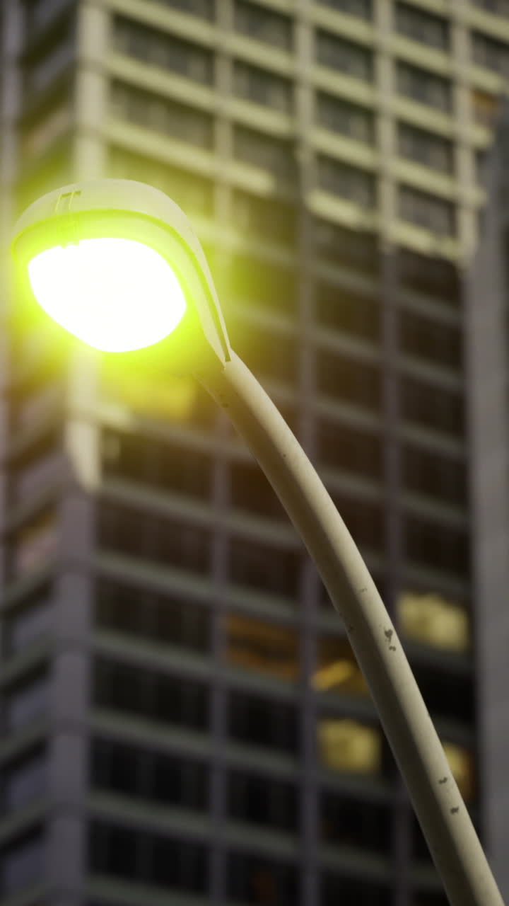 Urban evening glow of streetlight enhancing city architecture at dusk