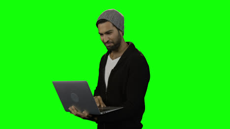 young man using laptop