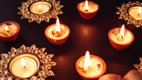 diwali diyas being lit in 2020 in day time along with surgical masks