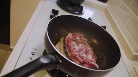 japanese a4 wagyu steak cook with sizzling oil cooked in a frying pan