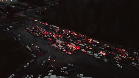 drone 4k footage christmas parade police sirene beacons traffic flying at night with cars and trucks in the dark