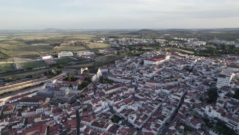 town of elvas, green landscape and distant horizon in portugal, aerial