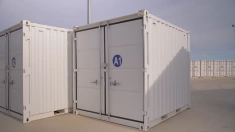 two small a1 containers standing ready for transportation