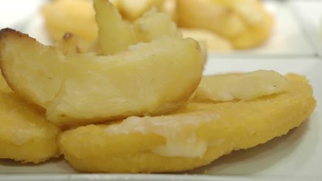 crispy fried potatoes and potato wedges