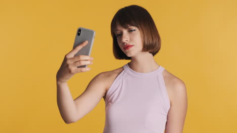 happy woman posing for a selfie photo