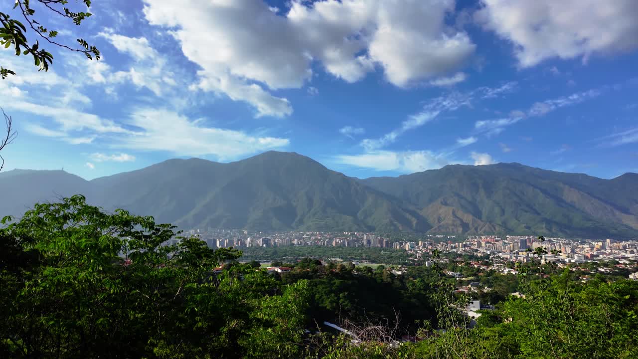 El Avila mountains overlooking the city of Caracas under a blue sky, From La Fila National Park
