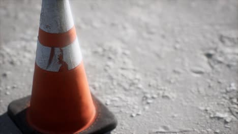 orange-and-white-striped-traffic-cone