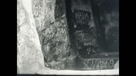 historic black and white video showing a charming mountain town in the ussr. circa ussr 1970: a captivating black and white video of a quaint mountain town from the soviet union era, providing a glimpse into the life of soviet people.