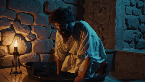 man in a historical bath scene