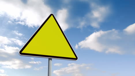 Empty-yellow-road-sign-over-cloudy-sky