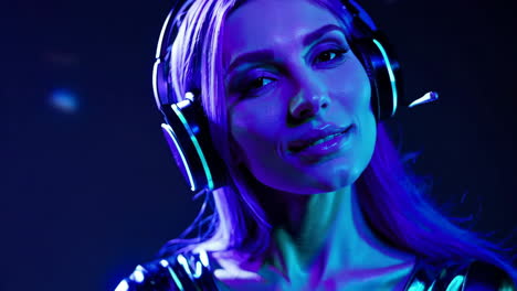 woman enjoying music in a neon-lit club