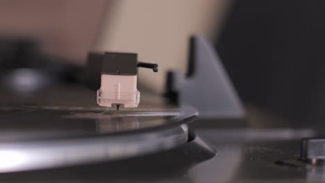 loopable stylus needle on vinyl record, infinite spinning lp player, record needle stylus head, 4k loop, close-up shot