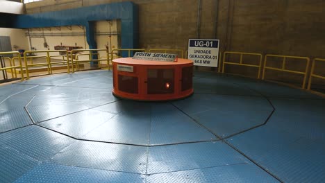 static shot of the top of a turbine generator in a water processing plant