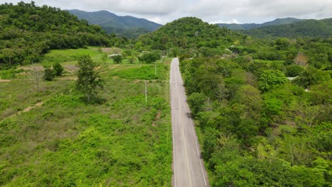 reverse aerial footage of kaeng krachan national park, unesco world heritage site, thailand