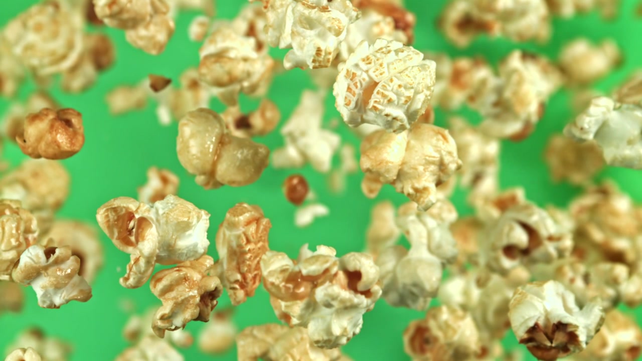 Popcorn Falling in Slow Motion on Green Screen