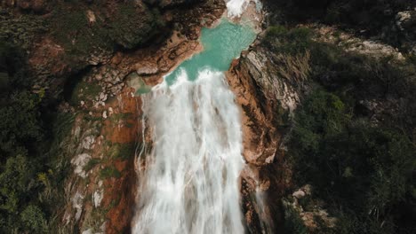 Bird's-Eye-View-Over-Chiflon-Waterfall-With-Clear-Blue-Water-In-Chiapas,-Mexico---drone-shot