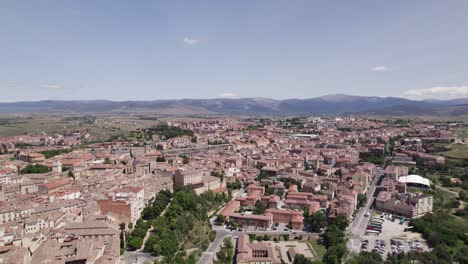 Aerial:-Segovia-cityscape-on-a-sunny-day,-showcasing-its-beauty