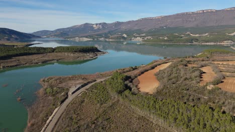 Drone-orbiting-the-castle-of-the-abandoned-village-of-Ruesta,-Spain