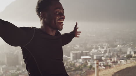 man stretching outdoors with city view