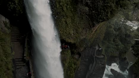 famous pailon del diablo waterfall in baños de agua santa, ecuador - tilt down