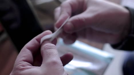 legalising-cannabis-smoking-cigarettes-with-hand-stock-footage