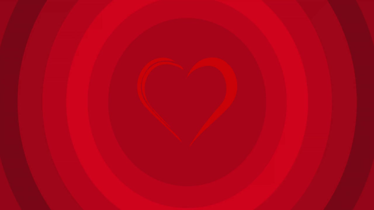animación del corazón sobre círculos rojos sobre fondo rojo