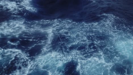 Choppy-Ocean-Seen-from-Ship-with-Rough-Waves-in-Open-Sea,-Blue-Water-Big-Swell-Background-on-a-Cruise-Ship-Boat-Trip-Crossing-Drakes-Passage-to-Antarctica-and-Antarctic-Peninsula