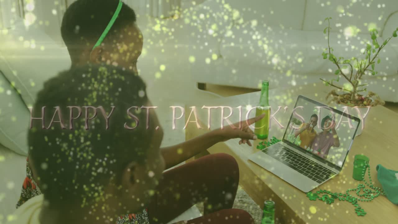 Animation of happy st patrick's day over couple celebrating with friends on laptop video call