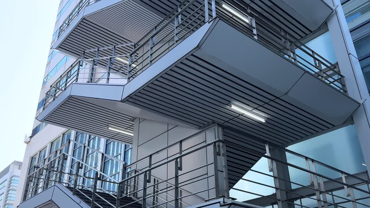 Modern building architecture in Tokyo with unique staircase and balcony design