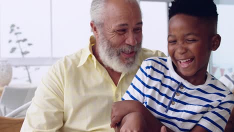 Mature-man-enjoying-time-with-his-grandson