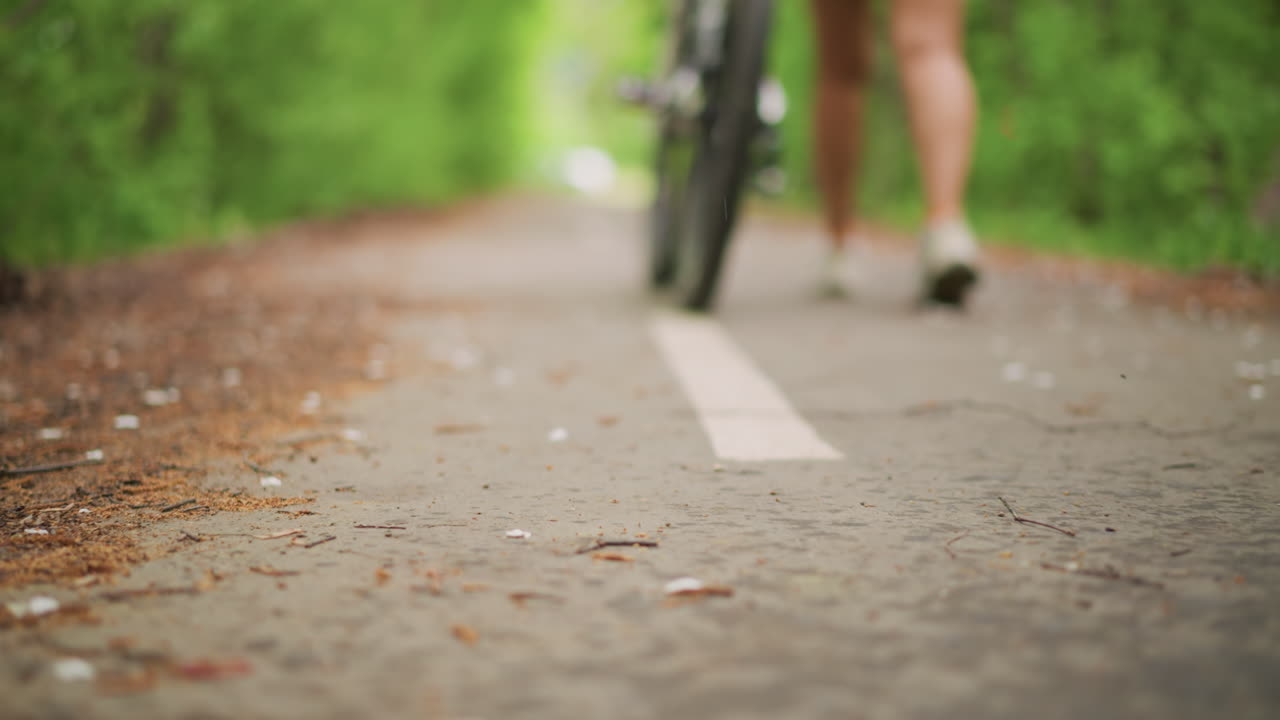 Street Scene With Moving Woman, Closeup Of Woman Walking On Pavement, Low Angle Shot Of Woman Crossing Painted Boundary Line, Footstep Sounds Near Boundary As Woman Moves Along Street In Focus