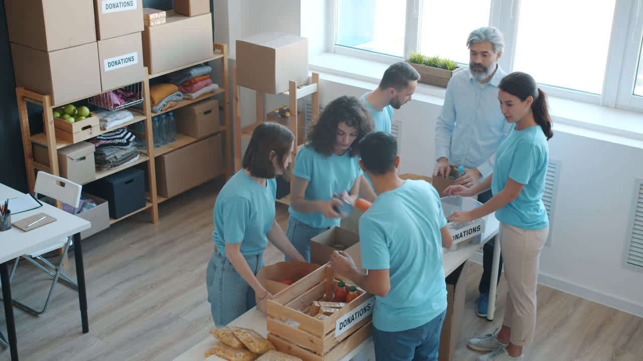Volunteers Sorting and Packing Donations