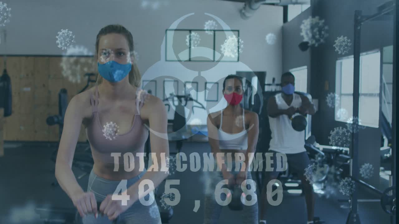 코로나19 세포가 다양한 그룹 위에 떠다니고 마스크를 쓰고 운동하는 애니메이션