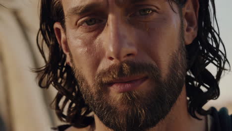 close-up of a man portraying a religious figure