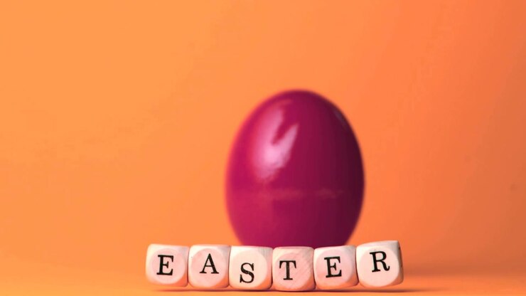 Gold confetti bursting, causing letter cubes tumbling past glossy magenta egg, forming EASTER row