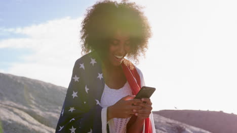 animation of social media icons with numbers over african american woman using smartphone