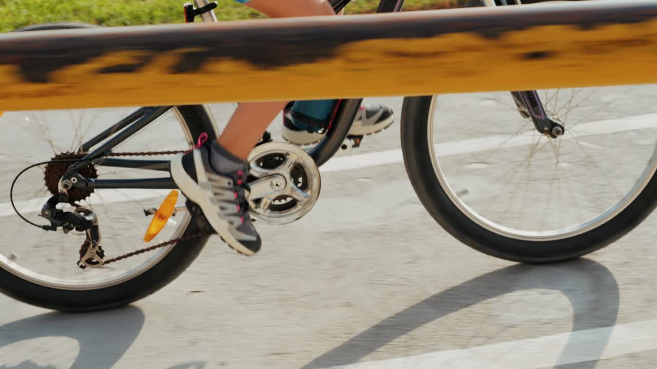 Man ride bicycle near beach in Barcelona, city morning, carbon neutral transportation. Travel, sustainability and cycling with male speed and transit,