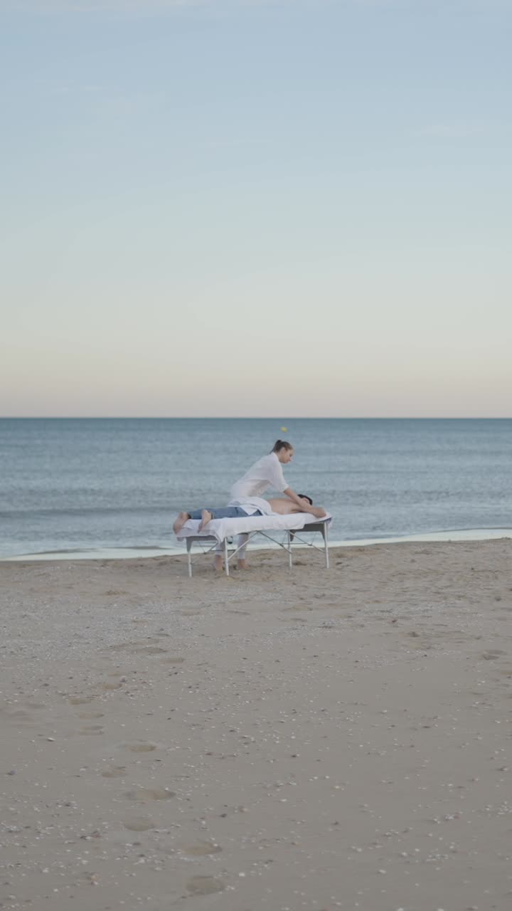 Relaxing beach massage by the ocean