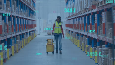 animation of digital data processing over biracial woman working in warehouse