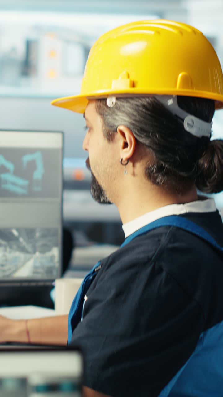 Vertical Video Solar Panels Manufacturing Plant Technician Uses Cad Program To Optimize Layouts