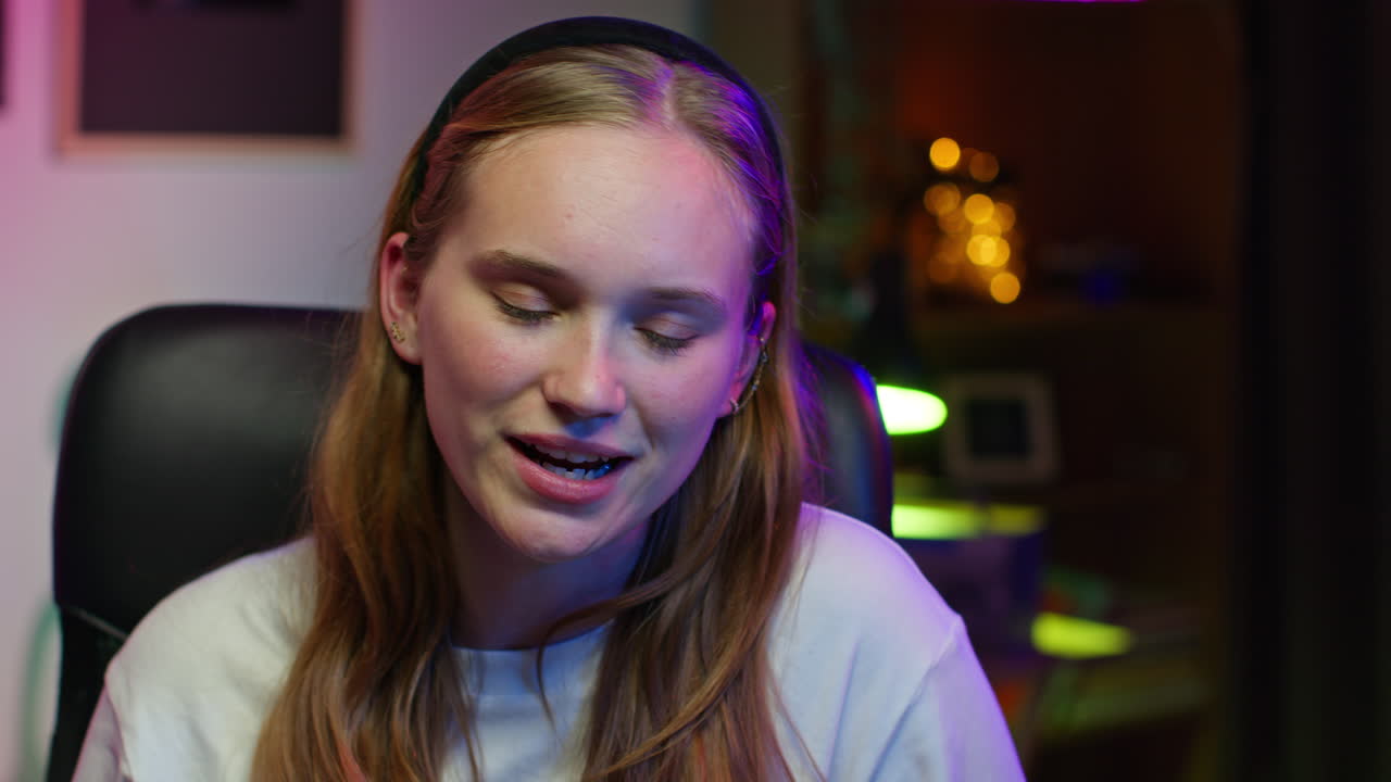 Smiling young woman looking at the camera
