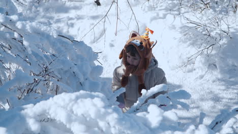 Korean-Mother-With-Mixed-Toddler-Girl-Walks-in-Snow-Covered-Balwangsan-Mountain-Top-Mona-Park---slow-motion,-Winter-in-Gangwon-do,-South-Korea