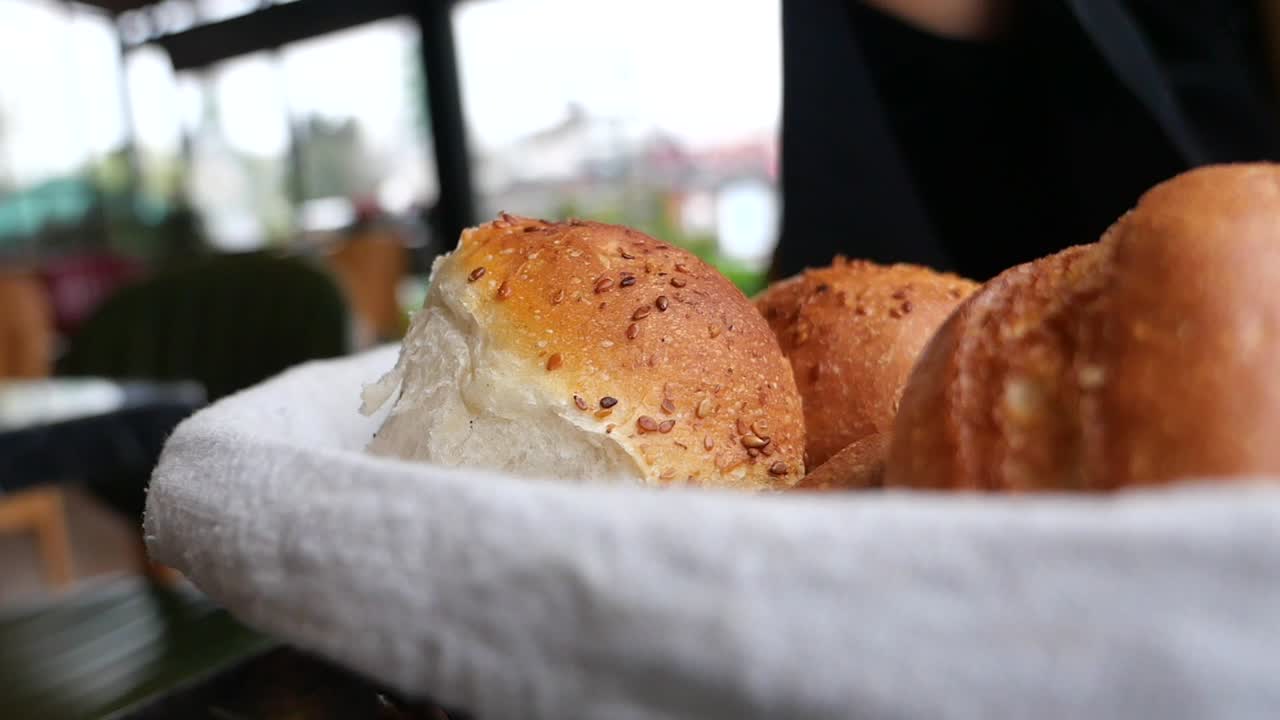 Fresh bread rolls in a basket