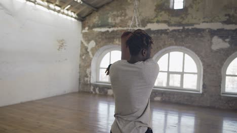 Professional-Mixed-Race-Boxer-Warming-Up-Before-General-Training