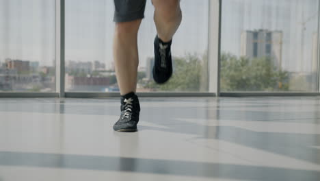 person walking/running in boxing shoes