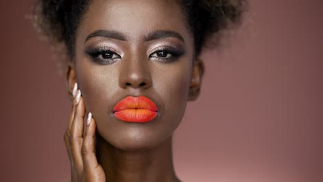 beautiful african american woman with bold makeup